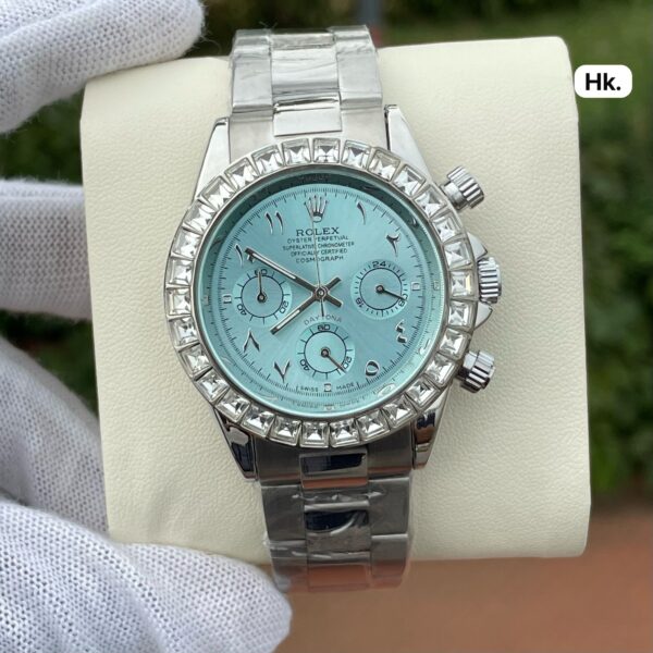 Rolex Daytona Rainbow Watch – Black Dial, Silver Strap, Gem-Set Bezel