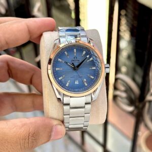 Buy Omega Seamaster Aqua Terra men's watch with 3D blue dial, sweep movement, and rose gold bezel.