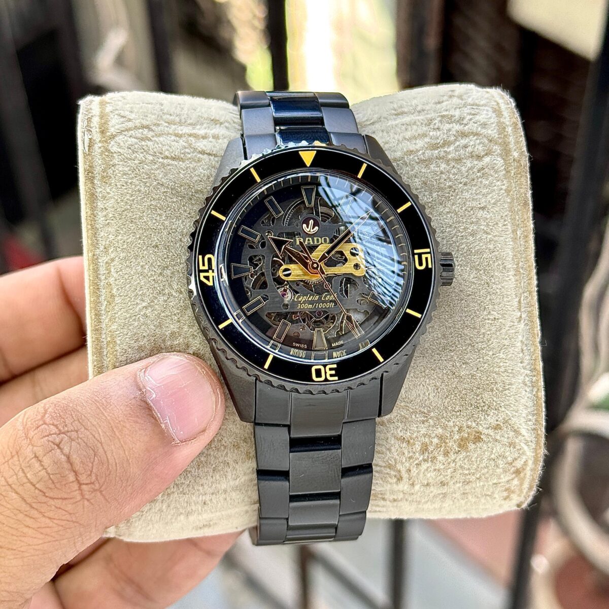 Rado First copy Captain Cook Skeleton Ceramic Watch – Black and Gold Automatic Dial