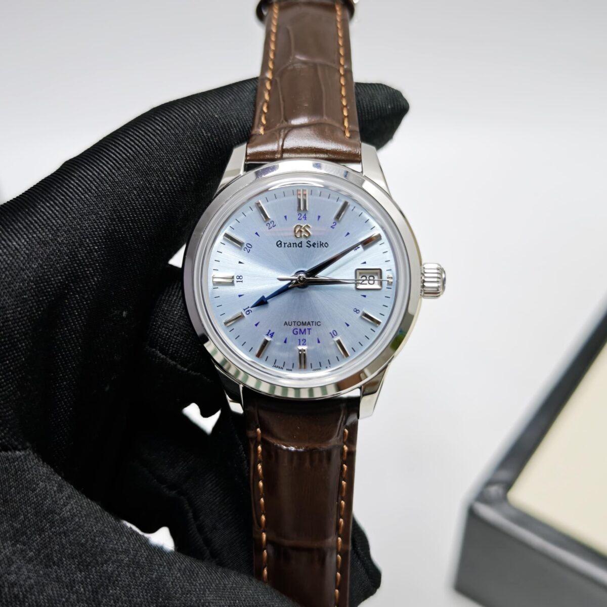 Grand Seiko SBGM253G GMT men’s watch – sky-blue dial with leather strap