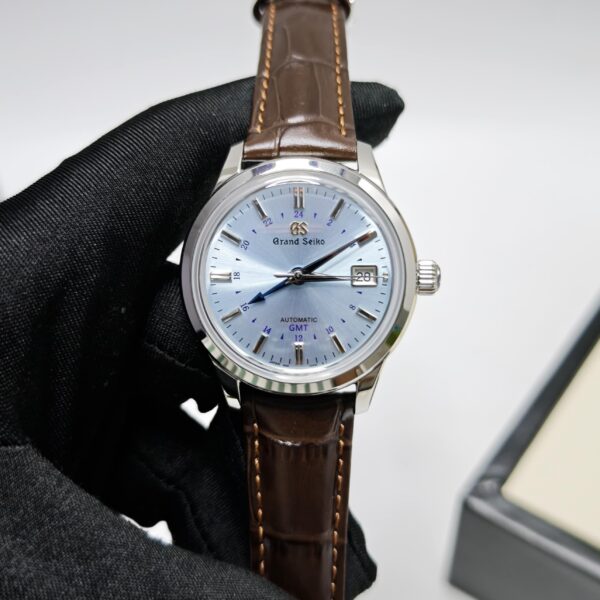 Grand Seiko SBGM253G GMT men’s watch – sky-blue dial with leather strap