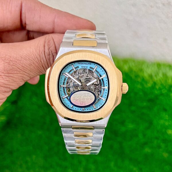 First Copy Patek Philippe Skeleton Tiffany Dial Automatic Men’s Watch with open movement, 40mm case, metal bracelet, sapphire-inspired glass, and secure clasp lock.