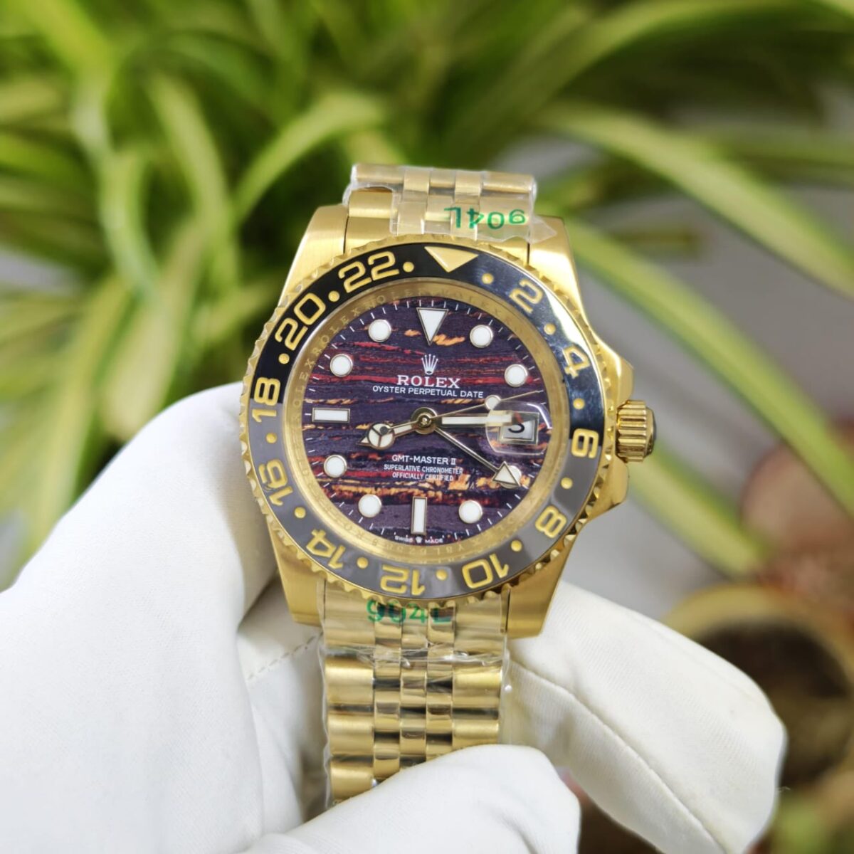 Rolex GMT-Master II Tiger Icon Dial men’s automatic watch. 40mm case, gold & rose gold body