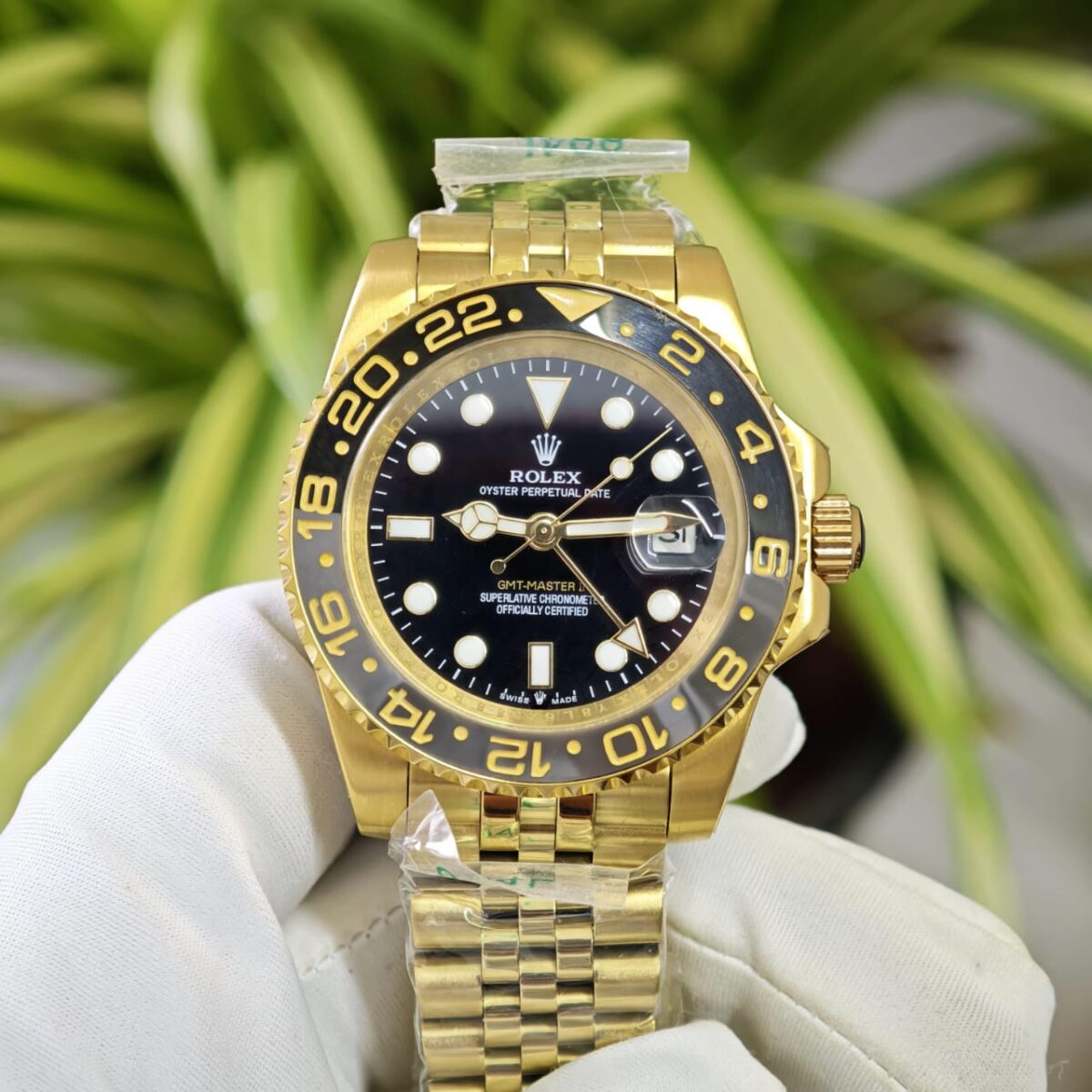 Rolex GMT-Master II men’s watch – 40mm gold, ceramic bezel, automatic movement