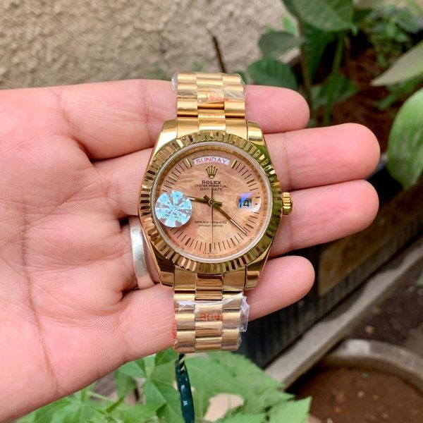 Rolex Day-Date Orange Dial Fluted Bezel